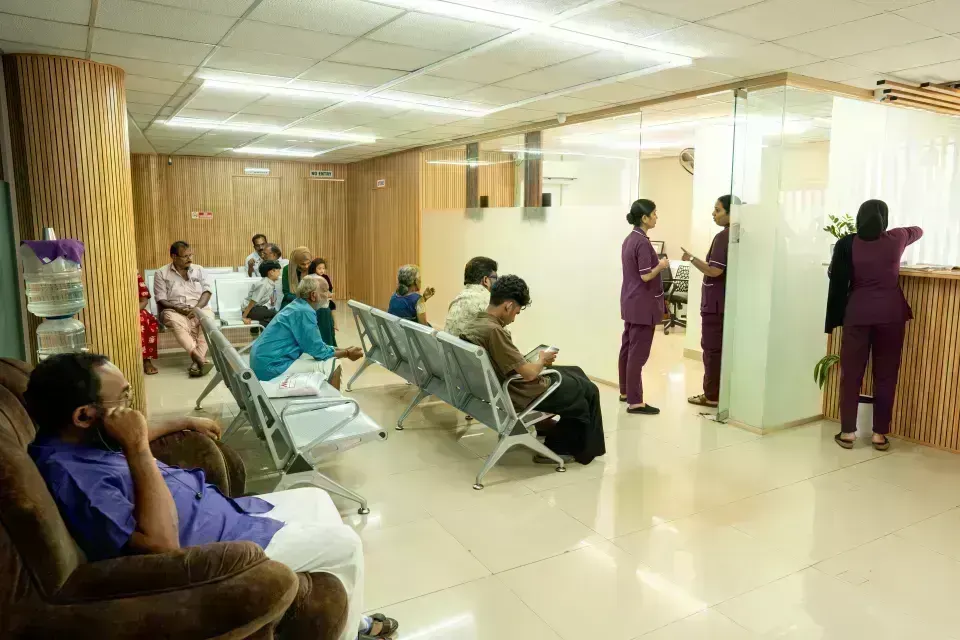 Spacious patient waiting area with comfortable seating at Kiranam Eye Hospital, Kechery, Thrissur