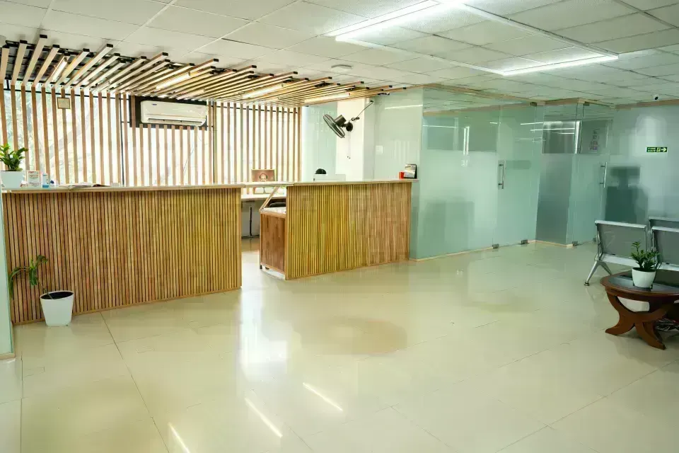 Reception desk and patient registration area at Kiranam Eye Clinic, Kechery, Thrissur